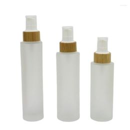 Botellas de almacenamiento 100ML 120ML 150ML Botella de vidrio esmerilado con bomba de loción de bambú Pico Modelo Boquilla Cosméticos vacíos Embalaje 10 Unids / lote.