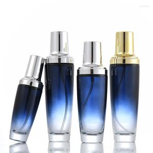 Opslagflessen 100 ml blauw glas lotion fles goud/zilveren pomp/spuit serum/emulsie/lotion/foundation/toner bleken cosmetische verpakking