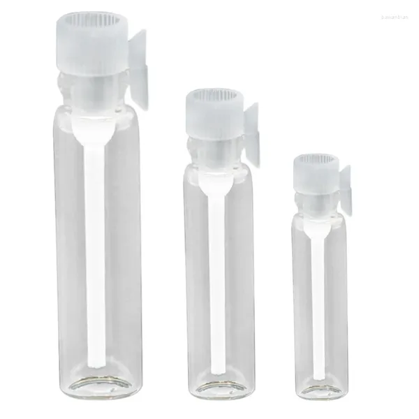 Bouteilles de rangement 100pcs 3 ml mini flacons d'échantillon de bouteille en verre vide vide avec capuchon en plastique pour chute d'huile essentielle