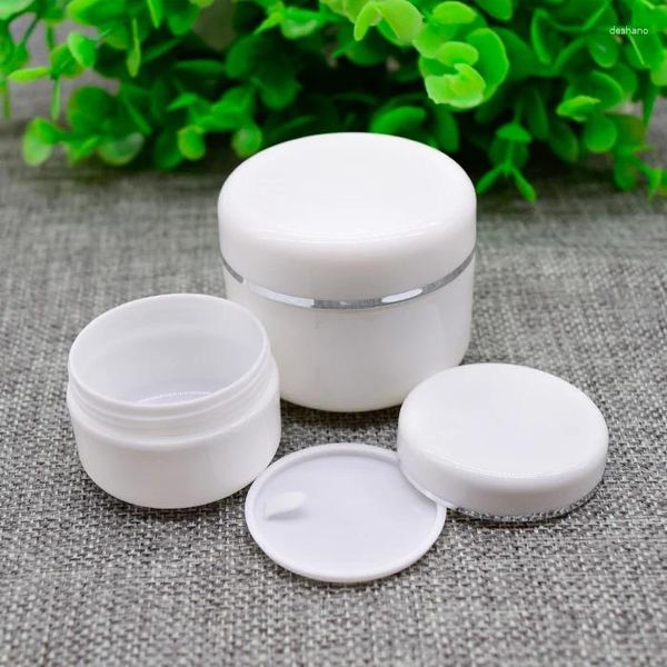 Bouteilles de rangement 100pcs 50g blanc rond Crème Bouteille en plastique JAR CONTERITEUR COSMÉTIQUE PLANT avec ligne d'argent