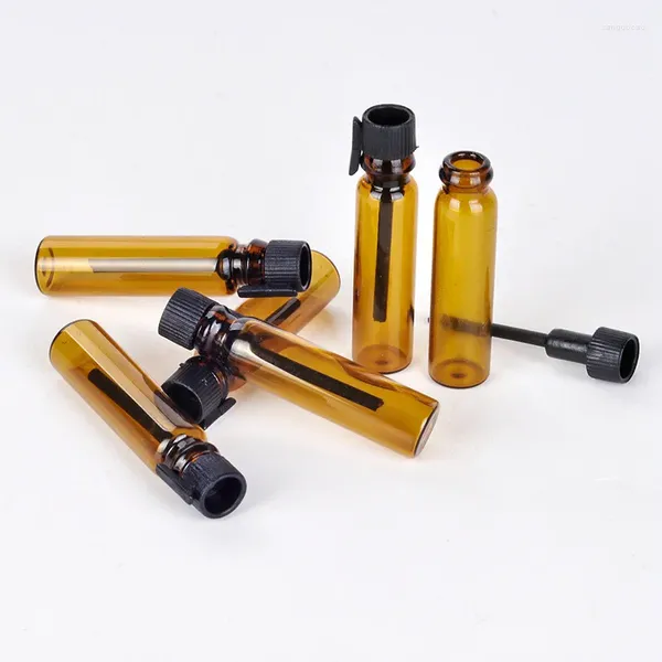 Bouteilles de rangement 100pcs / lot 1 ml de parfum en verre ambre bouteille rechargeable mini échantillon de flacons d'huile essentiel