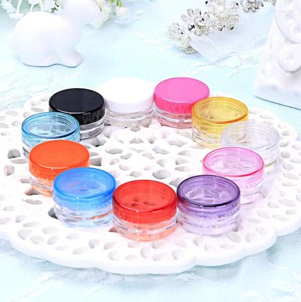 Bouteilles de rangement 100pcs / lot 3G / 5G Couleur de mélange Petite cosmétique Refillable Plastique Ferme à ours issue Makeup Face Crème Jar Pot Pot Container Bottle