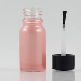 Botellas de almacenamiento 100pcs Estilo de aceite esencial de 10 ml Viales de vidrio Vacío de esmalte de uñas Pink Botella contenedor cosmético