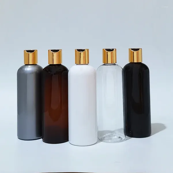 Botellas de almacenamiento 10pcs 300 ml de recipientes de botella de plástico blanco Tapa de prensa dorada 10 oz de champú ducha gel empaquetado de aluminio cubierta superior cubierta