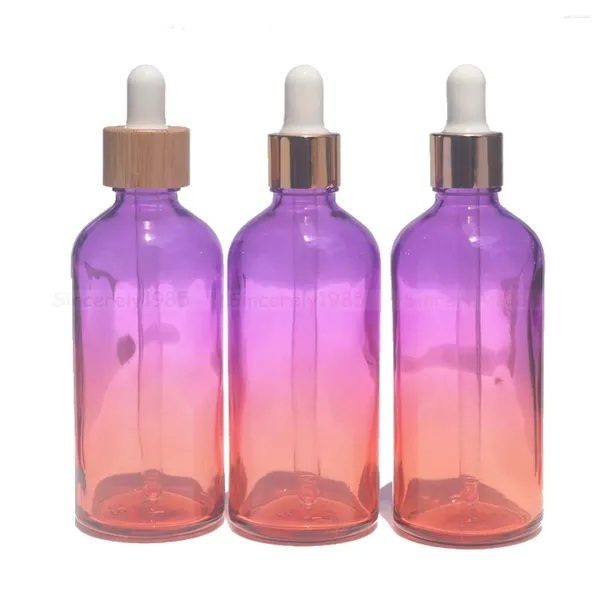 Botellas de almacenamiento 10pcs 30 ml 50ml 100 ml de vidrio de vidrio con tapas de bambú Cubierta de oro de oro Gradiente Pink Bottle for Essential Oil Perfume