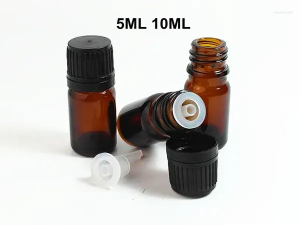 Botellas de almacenamiento 10pcs 5 ml 10 ml Golpero de vidrio ámbar para contenedores cosméticos de aceite esencial 5cc con tapa de plástico