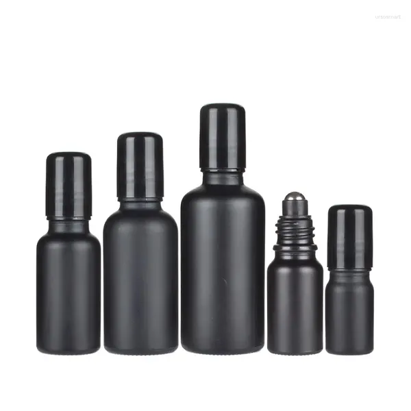 Bouteilles de rangement 10pcs Bouteille de recharge noire mate Perle en verre à rouleau en acier 5 ml 10 ml15 ml 20ml 30 ml 50 ml 100 ml Rouleau d'huile essentielle vide sur les flacons