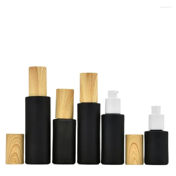 Bouteilles de rangement 10pcs bouteille brume bouteille mate noire cosmétique rechargeable faux bois couvercle de pompe blanche en verre lotion 30ml40ml50ml60ml80ml100ml