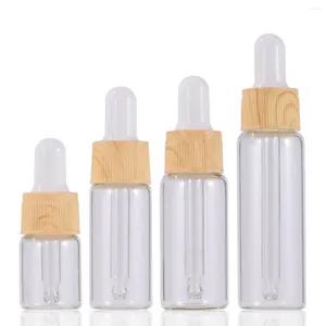 Bouteilles de rangement 10x 5 ml - 20 ml en verre transparent goutte de bouteille à la bouteille pour l'œil dripper drippillable huiles essentielles de parfum Pipette de parfum Pipette de bois en bois