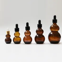 Bouteilles de rangement 1pc 10/20/30/50 / 100 ml Bouteille en verre d'ambre Pipette de parfum Essential Pipette Refipillable Contaiteur vide pour grosse
