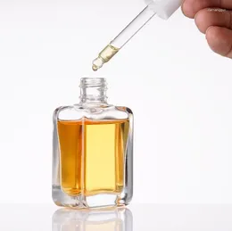Bouteilles de rangement 200pcs emballages cosmétiques 30 ml carrés clairs fantaisie huile essentielle d'huile de sérum en verre goutte à compte de gouttes avec œil sn1819