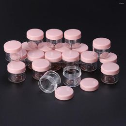 Bouteilles de rangement 20pcs 20g mini portable Round Pot de voyage Échantillon de voyage vide pour le shampooing à la crème pour le visage Lotion de shampooing (rose) à remplir