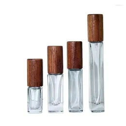 Botellas de almacenamiento 20pcs 3 ml 5 ml 10ml Glass Perfume Botella recargable Mini Cosmética Cosmética Vials vacío Automizador de tapa de madera Automizadora