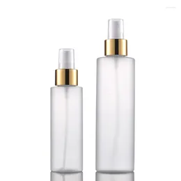 Bouteilles de rangement 20pcs / lot Frost Pet Plastic Bottle 100ml 200 ml Anneau d'or Pompe Atomizer Cosmetic Spray Perfume Regilable