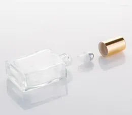 Bouteilles de rangement 240pcs 15 ml rouleau en verre transparent carré sur bouteille avec capuchon en or en acier inoxydable pour parfum d'huile essentielle sn241