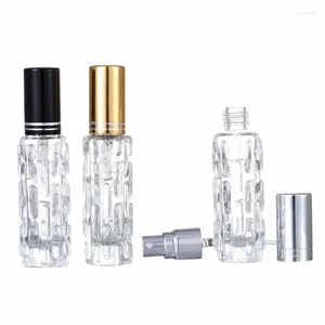 Bouteilles de stockage 25pcs 10 ml atomiseur spary rechargeable or argent couvercle noir vide emballage cosmétique rond bouteille de parfum en verre transparent