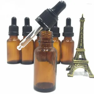 Bouteilles de rangement 300pcs 20 ml bouteille de gouttes en verre ambre 20 cm3 huile essentielle brune vide avec noir