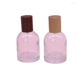 Bouteilles de rangement 30 ml 50 ml 100 ml bouteille de parfum arabe rond vide vide en verre transparent atomizer le couvercle du couvercle de la pompe à sertissage