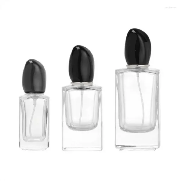 Bouteilles de stockage 30 ml 50 ml 100 ml en verre transparent à sertir bouteille de parfum couvercle noir portable vide fond épais carré emballage cosmétique flacons de pulvérisation