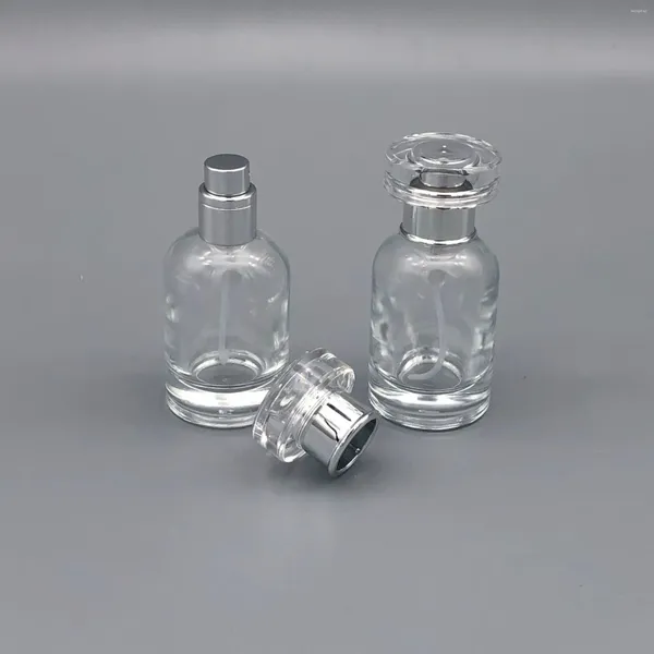 Bouteilles de rangement 30 ml bouteille de parfum premium avec couvercle en argent perfumes portables Dispensateur Cosmetic Spray Glass Eau