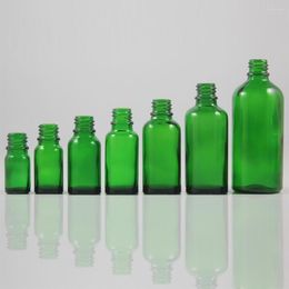 Bouteilles de stockage 30pcs 100ml bouteille d'huile essentielle en verre vert sans aucun bouchon pourrait avec pulvérisateur ou compte-gouttes 18mm