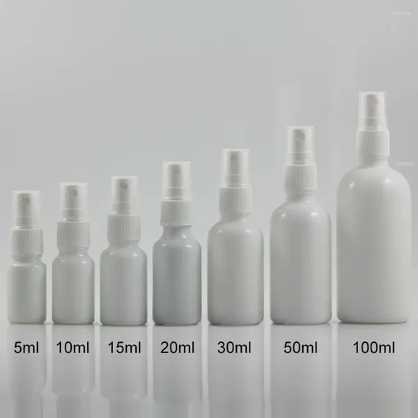 Bouteilles de rangement 30 pcs 30 ml Verre blanc Travel Refipillable Perfume bouteille avec atomiser en plastique Spray 1 once Continier Mist