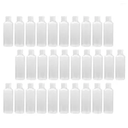 Bouteilles de rangement 30pcs Travels portables vides Set Refipillable Conteneurs avec bouchons pour la lotion de shampooing (100 ml)