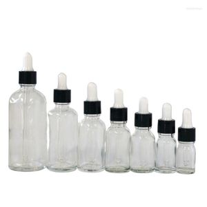 Bouteilles de stockage 5/10/15/20/30/50/100ml Bouteille d'huile essentielle transparente réutilisable avec bouchon compte-gouttes en caoutchouc Couvercle en plastique noir Conteneurs en verre