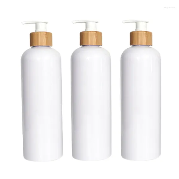 Botellas de almacenamiento 500 ml Plástico vacío Hombro redondo Botella blanca Anillo de madera de bambú Bomba de loción Recargable Envase de embalaje cosmético