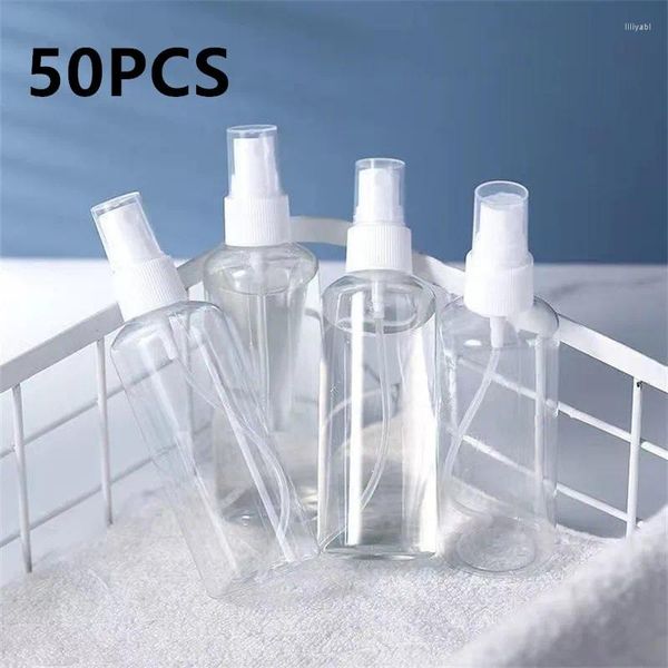 Bouteilles de rangement 50pcs 50 ml 100 ml Refipillable Transparent Plastic Perfume Bottle Atomizer ACCESSOIRES DE VOYAGE PORTABLE PORTABLE VIDE