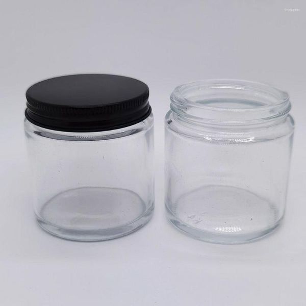 Bouteilles de stockage 50pcs Arrival100g bocal en verre transparent avec couvercle à vis en aluminium noir 100ml emballage de conteneur de boîte vide
