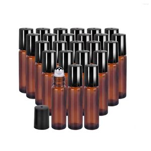 Bouteilles de stockage 50 pcs/Lot 5 ml/10 ml verre ambré rouleau sur bouteille pour flacons d'huile essentielle avec des conteneurs rechargeables à billes en métal