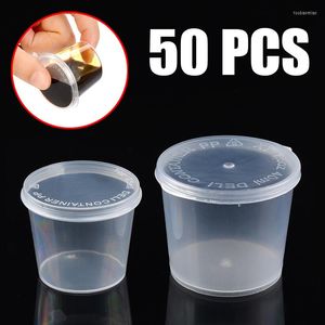 Bouteilles de stockage 50 pièces/ensemble en plastique transparent petite Sauce tasses alimentaires poche Condiments conteneurs boîtes avec couvercles d'étanchéité anti-fuite 1 oz/1.5 oz