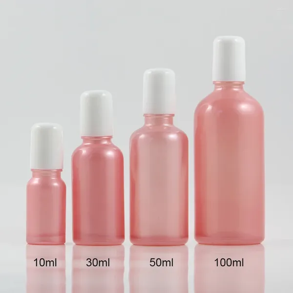 Bouteilles de rangement 50pcs en gros de 100 ml de couleur rose rose en verre rouleau sur un récipient de parfum 100 ml rouleau vide pour l'huile essentielle