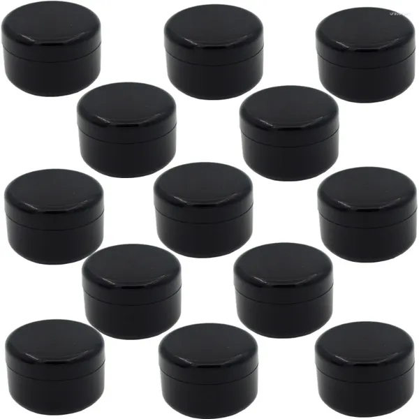 Bouteilles de rangement 50pcs en gros de 100 ml en plastique noir en plastique cosmétique pot avec une bouteille de tir de traction intérieure transparente vide petite capacité