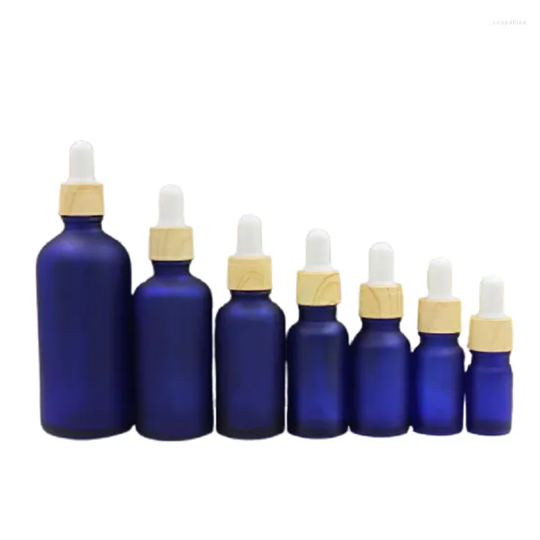 Botellas de almacenamiento de 5ml, 10ml, 15ml, 30ml, 50ML, 100ML, tapa de madera falsa, cuentagotas de goma, botella recargable, aceite esencial de esencia de vidrio azul helado vacío