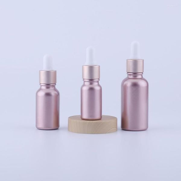 Botellas de almacenamiento 5pcs 10ml 15ml 30ml 50ml 100ml Pink Glass Dropper Bottle Vac￡ envasado cosm￩tico Vials de aceite esencial