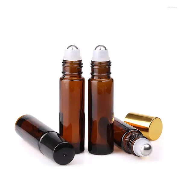 Bouteilles de stockage 600 pcs/lot 10 ml vide verre ambre huile essentielle rouleau sur flacons de bouteille avec bouchon en or noir pour parfum