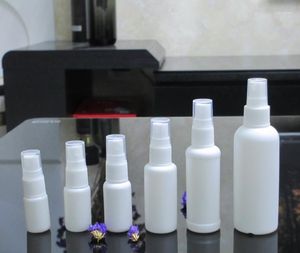 Botellas de almacenamiento 60ML 100ML Vacío PET Plástico blanco transparente Botella de spray de niebla fina Contenedores de rociador de agua SN724