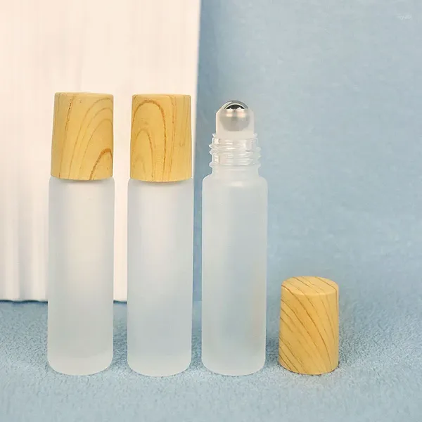 Bouteilles de rangement 6pcs / lot 5 ml10 ml rouleau sur la bouteille de parfum en verre givré épais DOTERRA rechargeable les flacons à rouleaux vides voyage