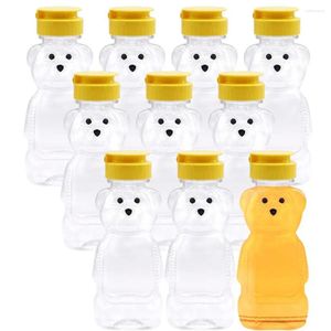 Bouteilles de stockage 7,78 oz en plastique ours miel bouteille presser pot avec couvercle rabattable tasse à boire du jus