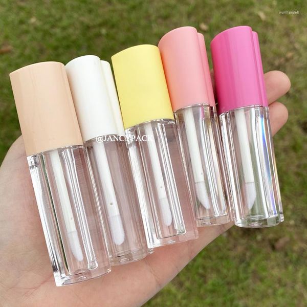 Bouteilles de stockage Tubes à lèvres colorés 4ml en forme de coeur Lipgloss Lipstick Container Oil With Brush Cosmetic Sample