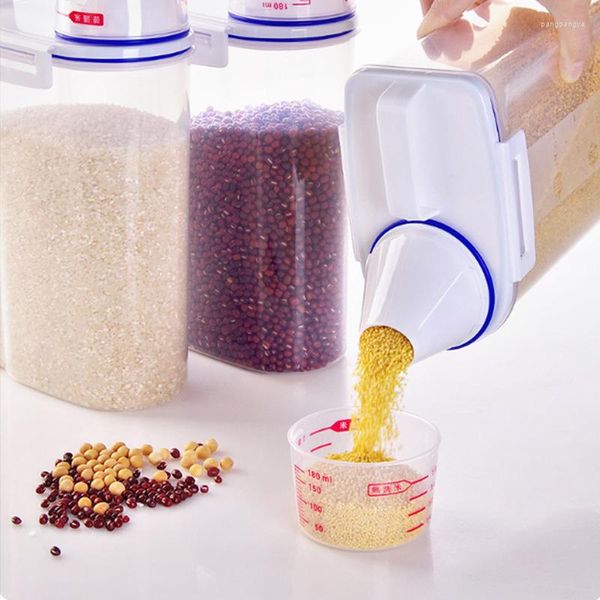 Les bouteilles de stockage couvrent le cylindre de riz la boîte de cuisine le baril a scellé l'organisateur en plastique épais de farine avec la nourriture