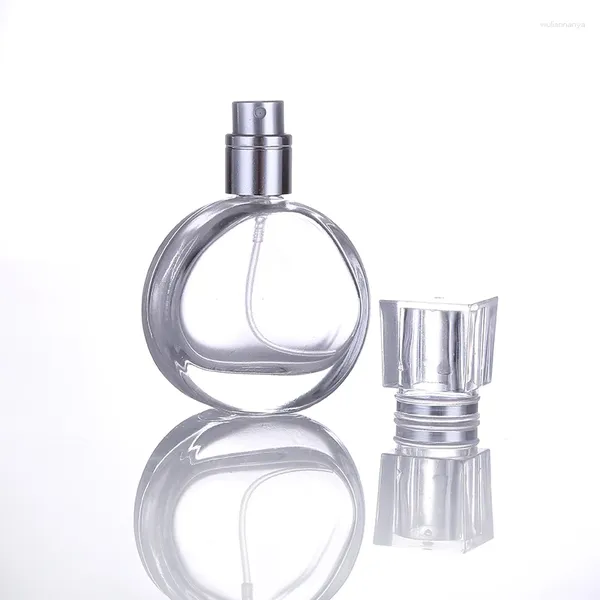 Botellas de almacenamiento logotipo personalizado Recarga vacía Botella de pulverización de bomba de perfume de vidrio de 25 ml para envases cosméticos