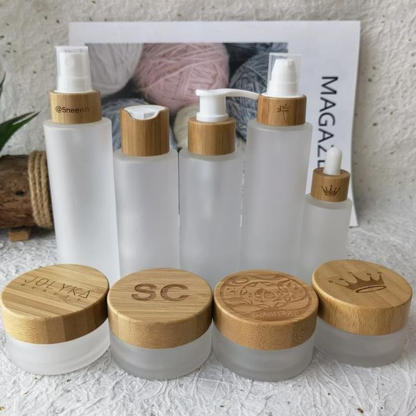 Bouteilles de rangement Logo Custom Makeup Verre givrée Jar Crème en plastique Pumple Airless Pump Lotion avec couvercle de soins de la peau de bambou Emballage de soins de la peau