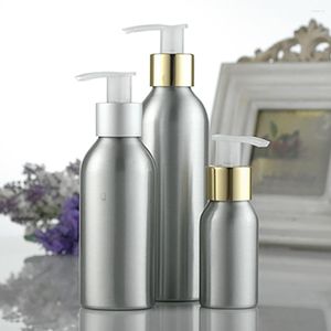 Botellas de almacenamiento Diseño Envase cosmético Botella de champú / loción de aluminio de 100 ml con interruptor ajustable Bomba dorada y plateada