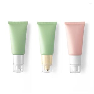 Les bouteilles de stockage vident le tube en plastique rose vert de la compression cosmétique 50g 50ml 1.8OZ avec la pompe sans air