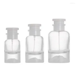 Botellas de almacenamiento Botella de perfume vacía Vidrete transparente Redondo Grueso Bottle Spray Bomba de engarzado Tapa blanca 30 ml 50ml 100ml 5pcs Atomizador de atomizador