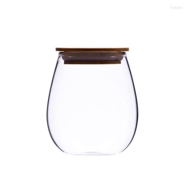 Le stockage met en bouteilles le thé en verre de bocal de petites fleurs portatives transparentes et fruit sec