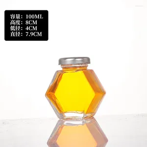 Bouteilles de rangement bouteille de miel en verre hexagonal avec dipper en bois en bois sticks pots d'emballage des pots de distributeur de distributeur de nourriture cadeau